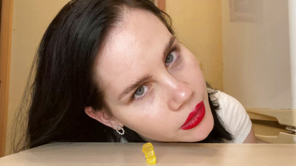 Giantess eats gummy bears and a toy. 4K