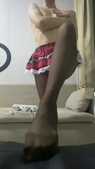 Sweet Teen Girl in Tights and Skirt