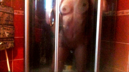 In the shower, doggystyle fucked a passionate beauty with an elastic body