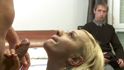 Blonde babe is riding stranger's cock on the bed