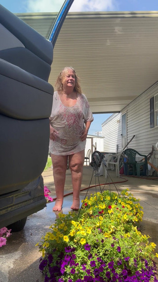 Watering Flowers Flashing Tits and Ass