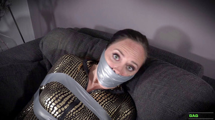 Leila - Catsuit crook in tape bondage