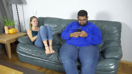 Black stud ignores the girl he tied up