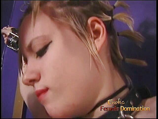 Stockinged submissive whipped and covered with wax by lezdom