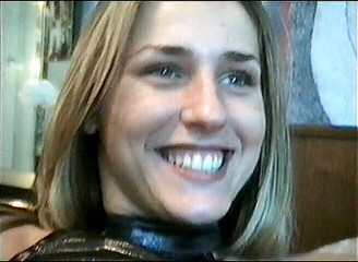 Pulling her leather dress off