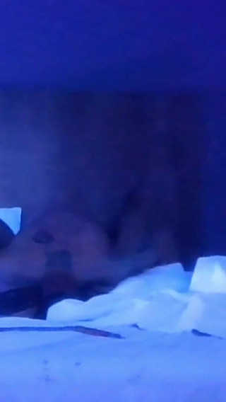 Couple Having Fun in Blacklight