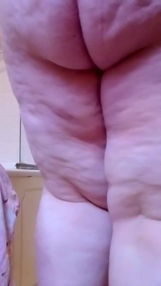 Naked SSBBW cleans lower camera view
