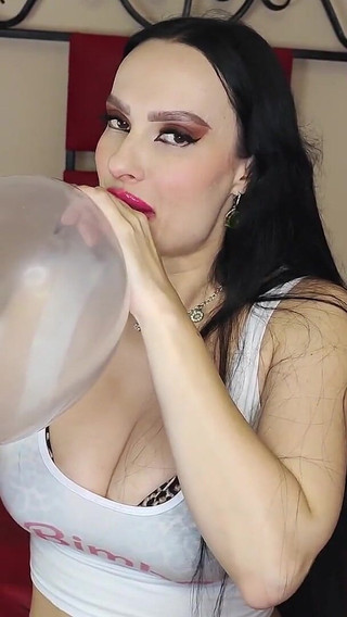 Big-lipped Bimbo Inflates a Condom and Plays with It. 1080