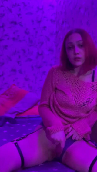 Red-haired Bitch in a Sweater Brings Herself to Orgasm