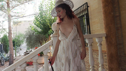 While Ariel Ortiz Sweeps the Entrance to Her House, Her Neighbor Records Her All Horny