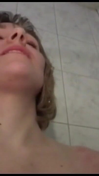 Hot Blonde Fingers Her Hairy Pussy in Bathroom