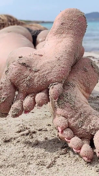 Covered in Sand and Above It All