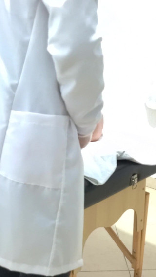 Proctologist Performs Anal Exam on Constipated Patient.