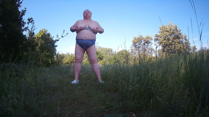 Stepmom Undressed in the Park and Pisses in Front of Everyone