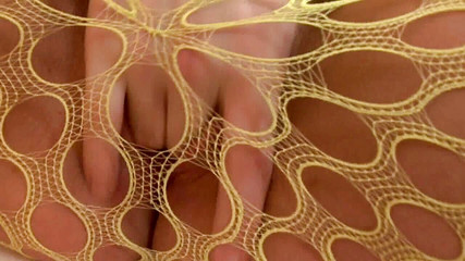 Busty teenager sucking cock and giving a boobjob