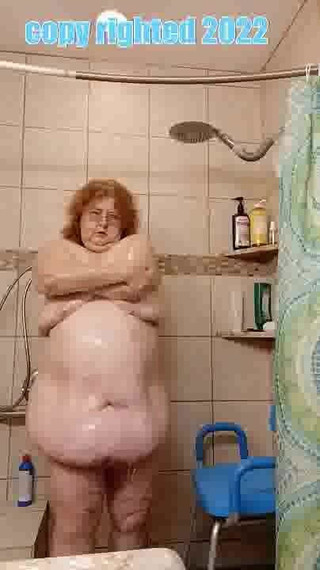 Mature Milf red head cleans her stinky sweaty body