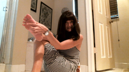 Rubbing lotion on my feet after my shower