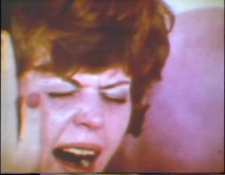 Lesbian babes play with their pussies and a huge cucumber