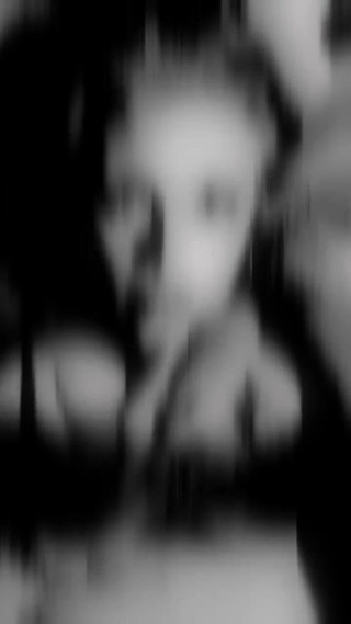 Busty Brunette Plays with Tits