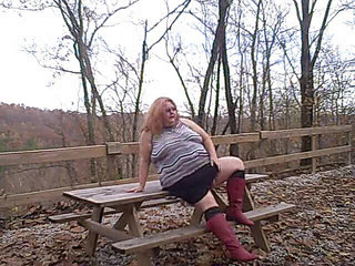 red boot cute out fit chilling after shooting some photos