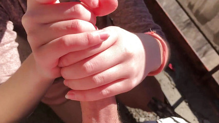 Jerking off his cock on the balcony