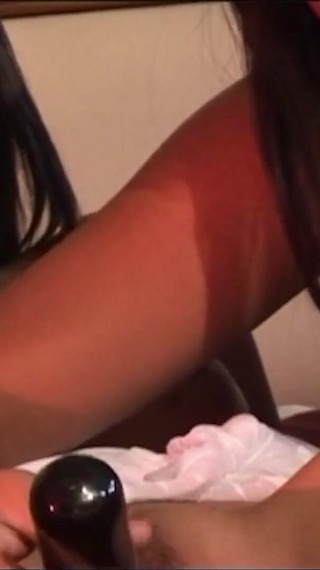 A Couple of Brunette Lesbians Bang Each Other with Sex Toys Until Cumming