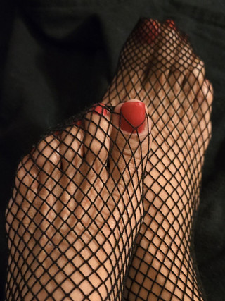 Tiny Feet in Fishnet Stocking... Red Toe Nails