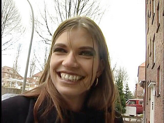 Brunette beauty interviewed on the street