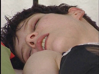 Brunette teen wearing lingerie and stockings masturbating solo