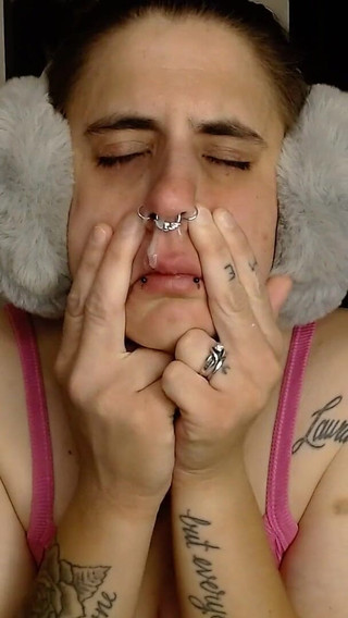 Sick Girl Makes a Snotty Mess All Over Her Face