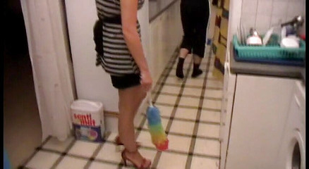 Poor Dude Must Clean Kitchen on Order of His Mistress