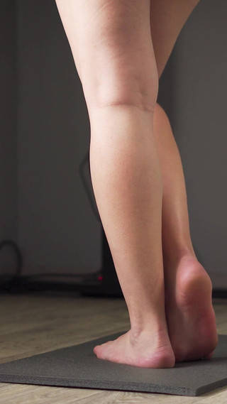 Watching Teen Calves At Standing Desk