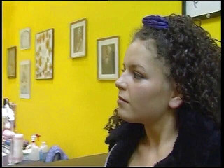 Fabulous brunette with curly hair wants a new tattoo