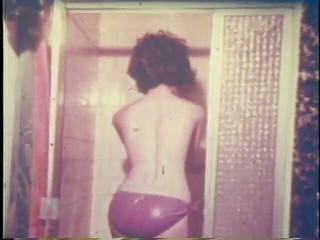 Hairy brunette MILF posing for the camera at casting