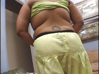 Indian big with a tattoo rides a cock in threesome